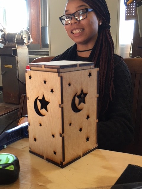 Kamiyah with one of her lasercutter projects