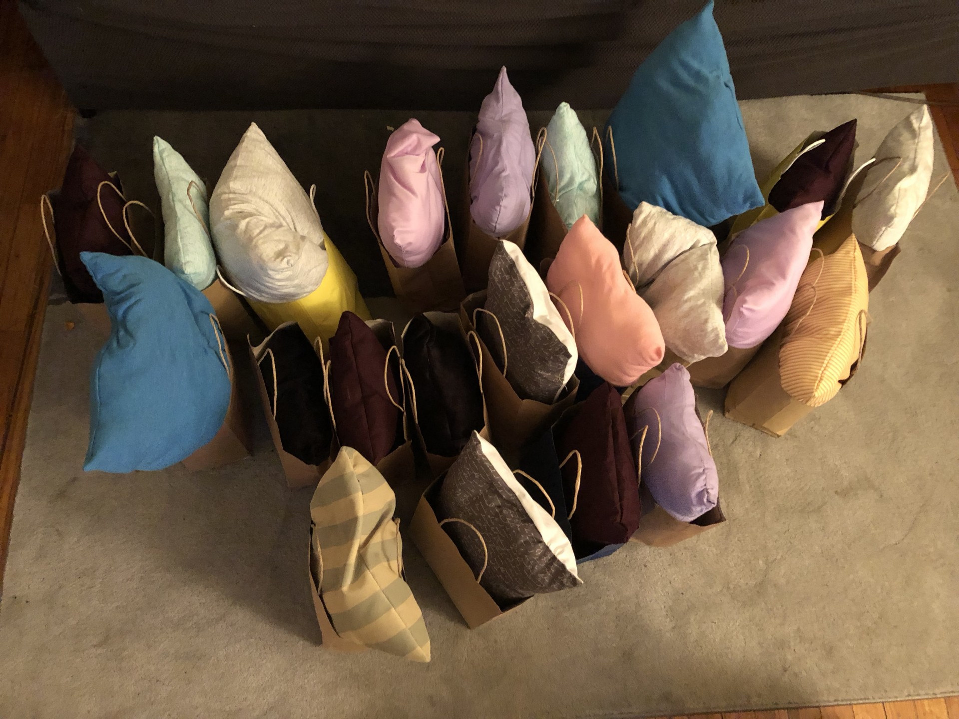 This is a picture of 22 pillows and care packages I made for a local women’s shelter.
